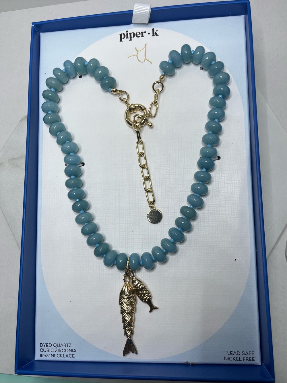 piper•k Sky Blue Beaded Necklace with Gold Chain and Fish Charms